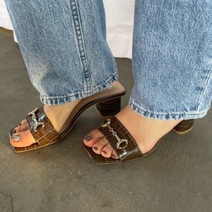 Steve Madden brown snakeskin kitten heels.